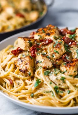 Delicious Marry Me Chicken Pasta served on a plate with fresh herbs