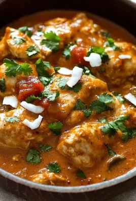 Delicious coconut chicken served with fresh herbs and spices