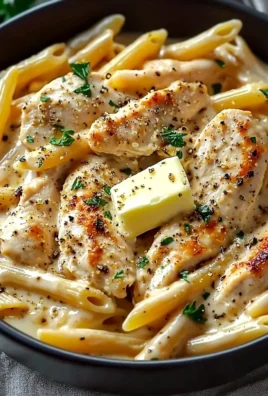 Creamy Crac Chicken Penne served in a bowl ready for dinner.