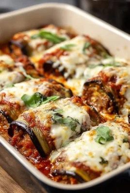 Fluffy Eggplant Rollatini Bake with cheese and fresh herbs