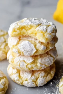 Delicious Lemon Crinkle Cookies with powdered sugar on a plate