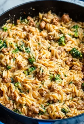 One-pot ground turkey orzo dish with fresh vegetables and herbs