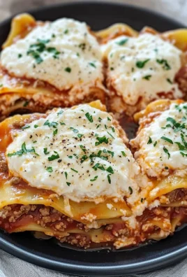 Delicious slow cooker lasagna layered with cheese and rich sauces