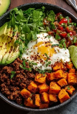 Delicious sweet potato taco bowl topped with fresh ingredients.