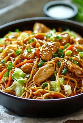 Delicious Chicken Chow Mein topped with homemade Chow Mein sauce