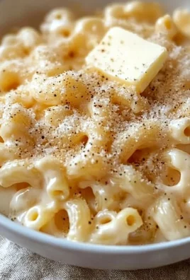 Creamy White Cheddar Macaroni and Cheese served in a bowl