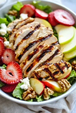 Refreshing grilled chicken salad with vibrant vegetables and dressing