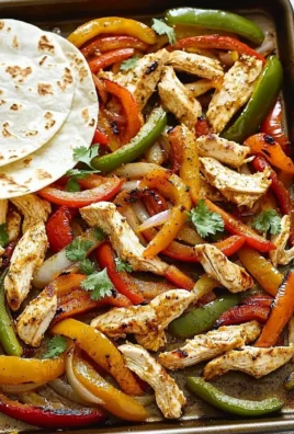 Sheet Pan Chicken Fajitas with colorful peppers and onions